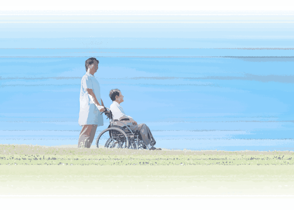 空を見上げる介護者と利用者